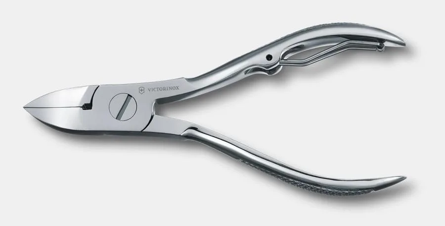 A silver Victorinox nail plier with a single screw pivot and textured handles, shown open on a white background.